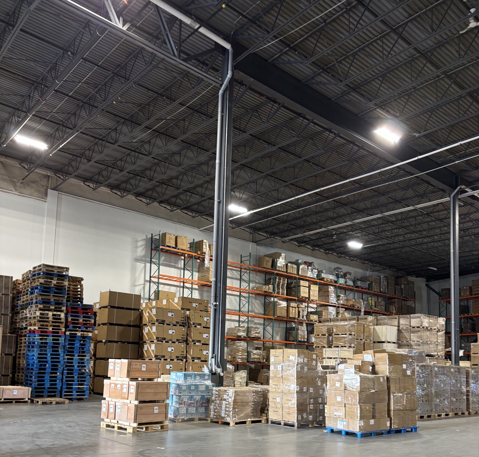 Cartons and pallets in a fulfillment warehouse